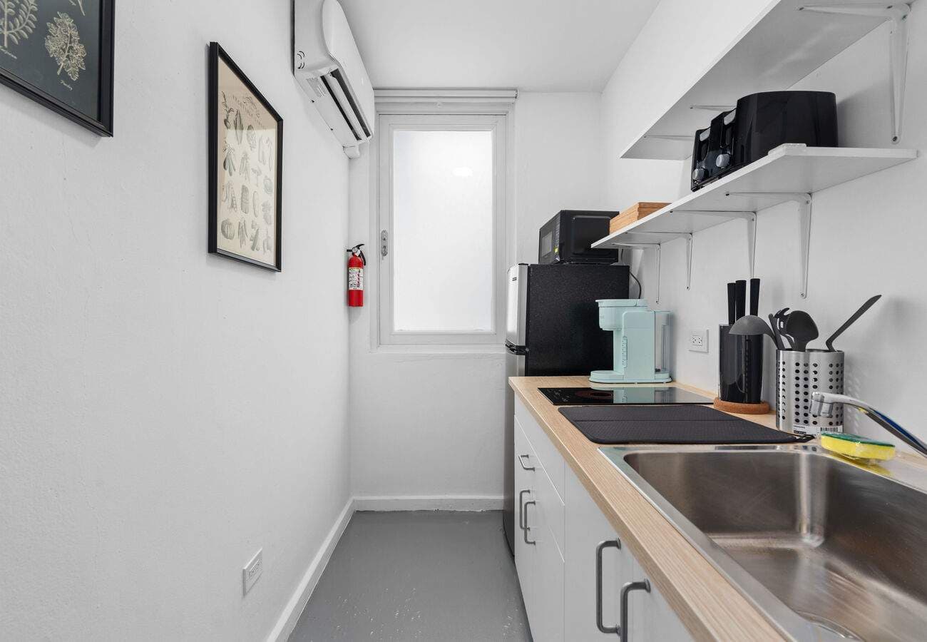 Compact kitchenette with coffee maker & A/C