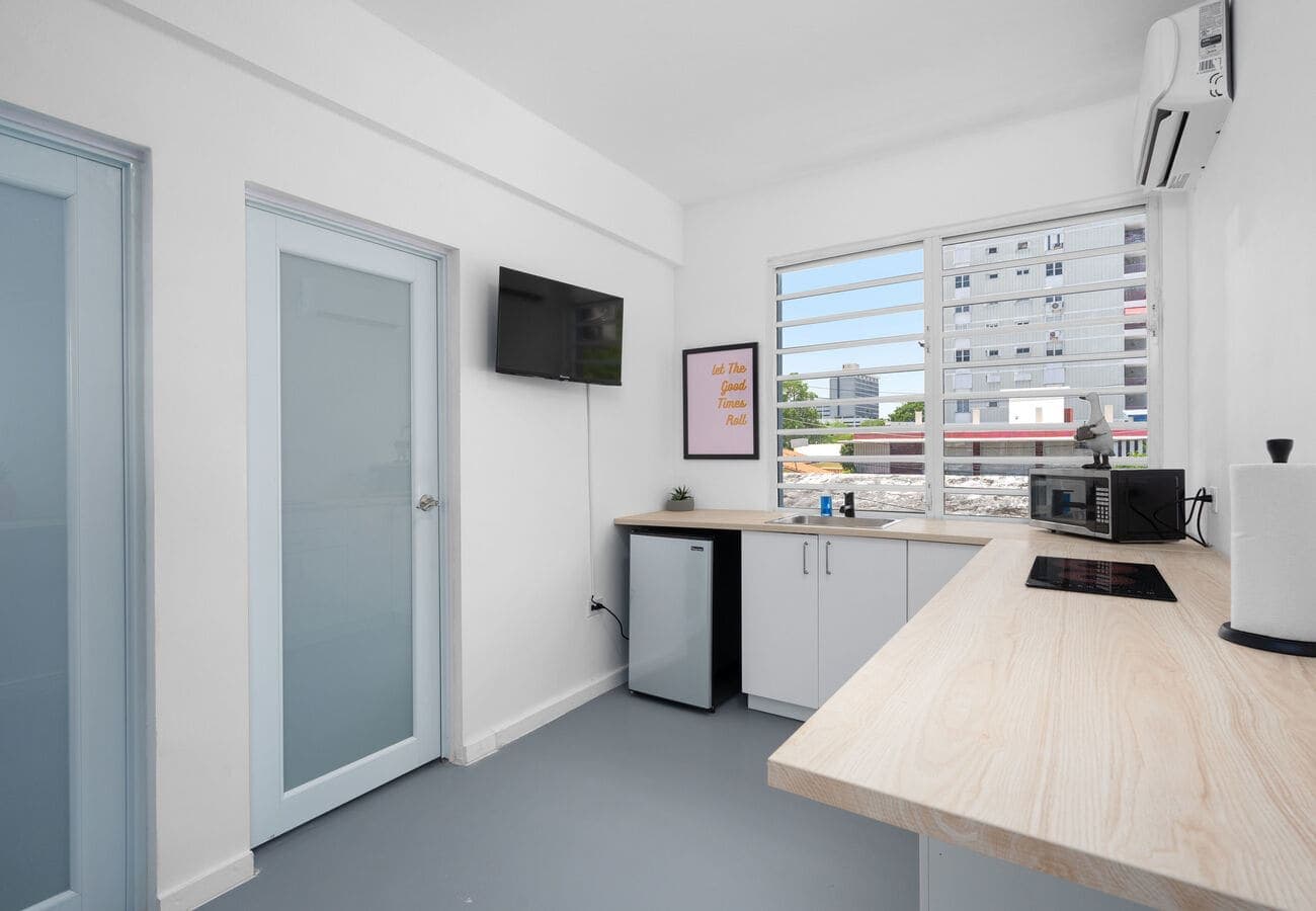 Sunny kitchenette with city views