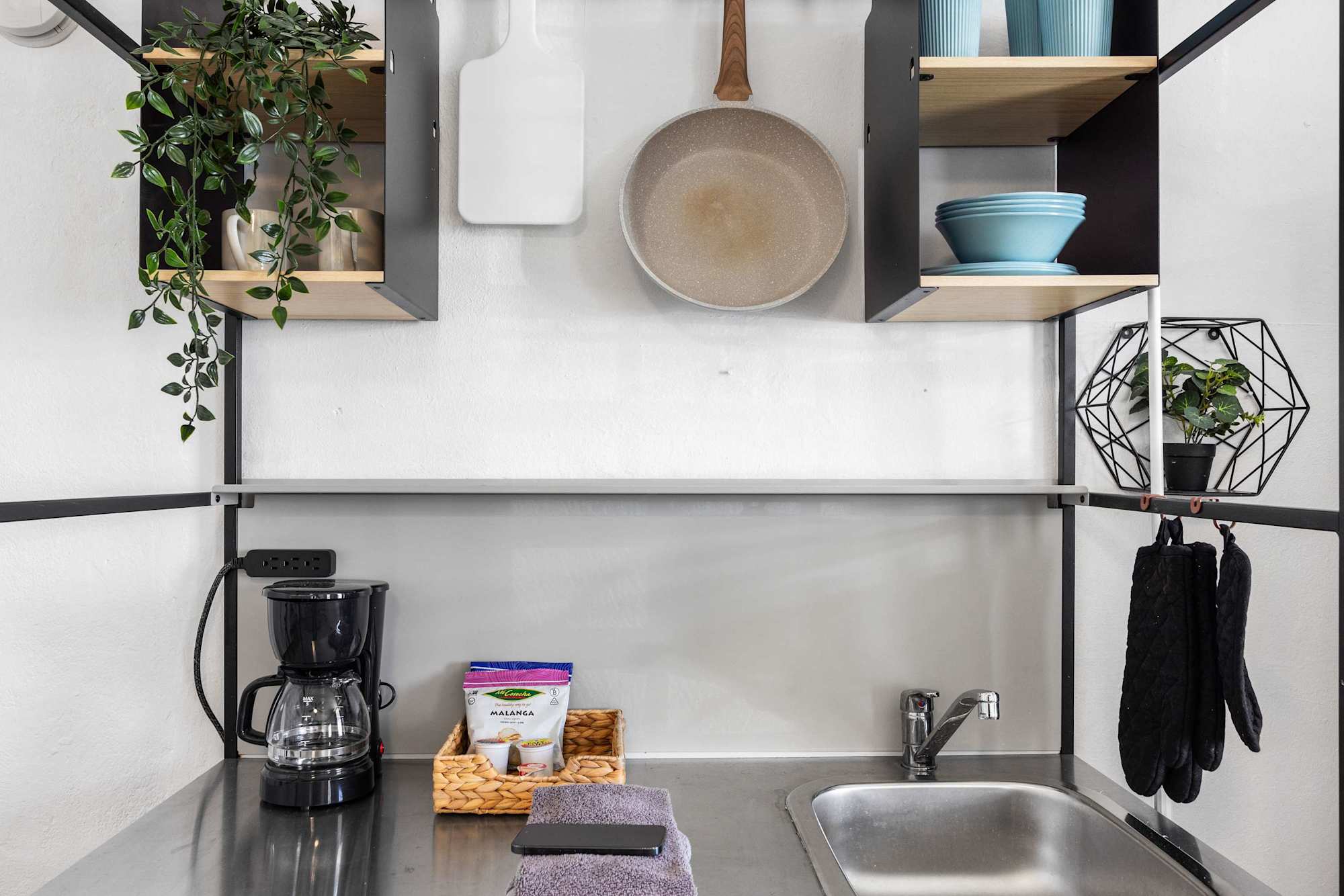 Kitchenette with stainless-steel fridge