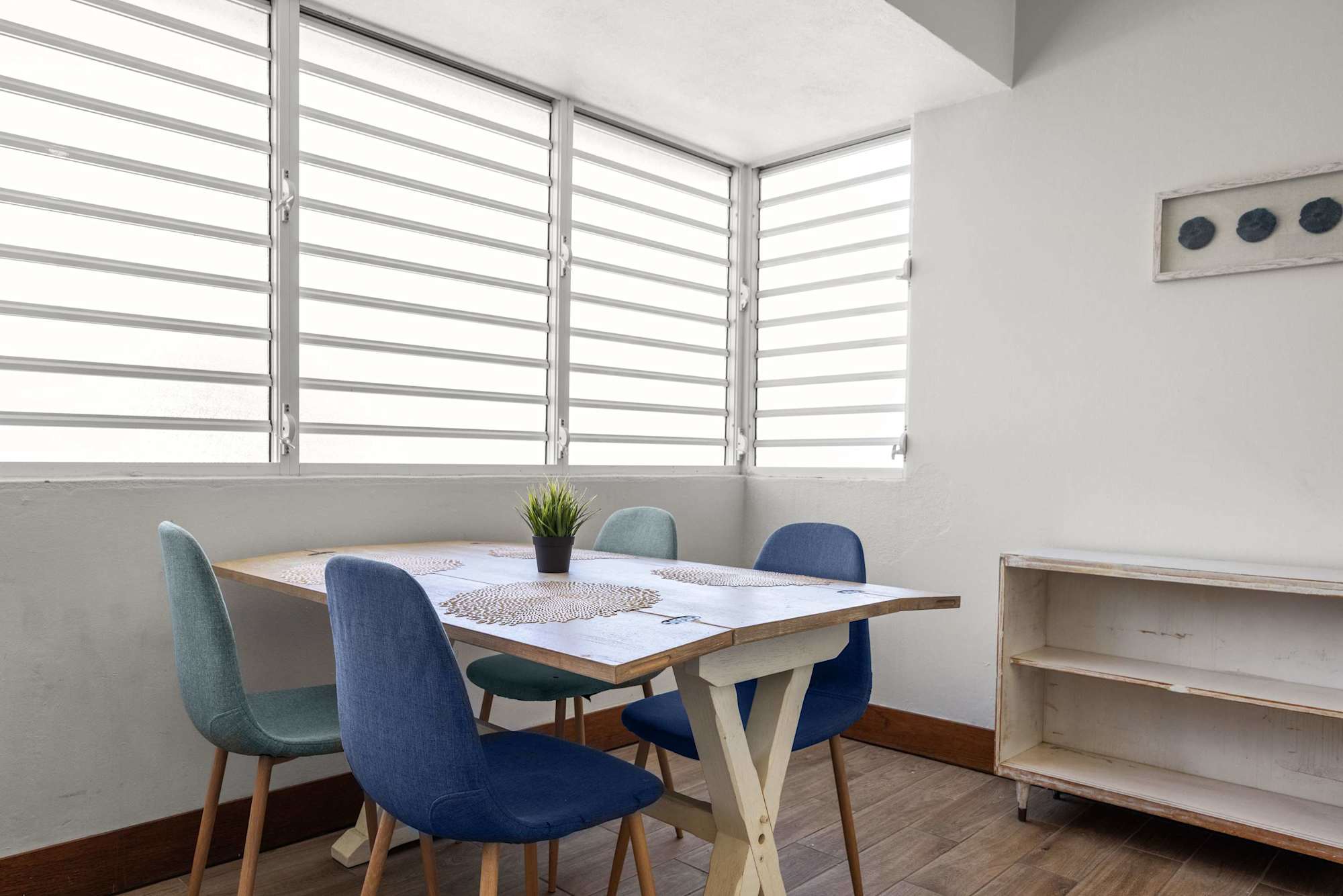 Sunny dining area with chairs