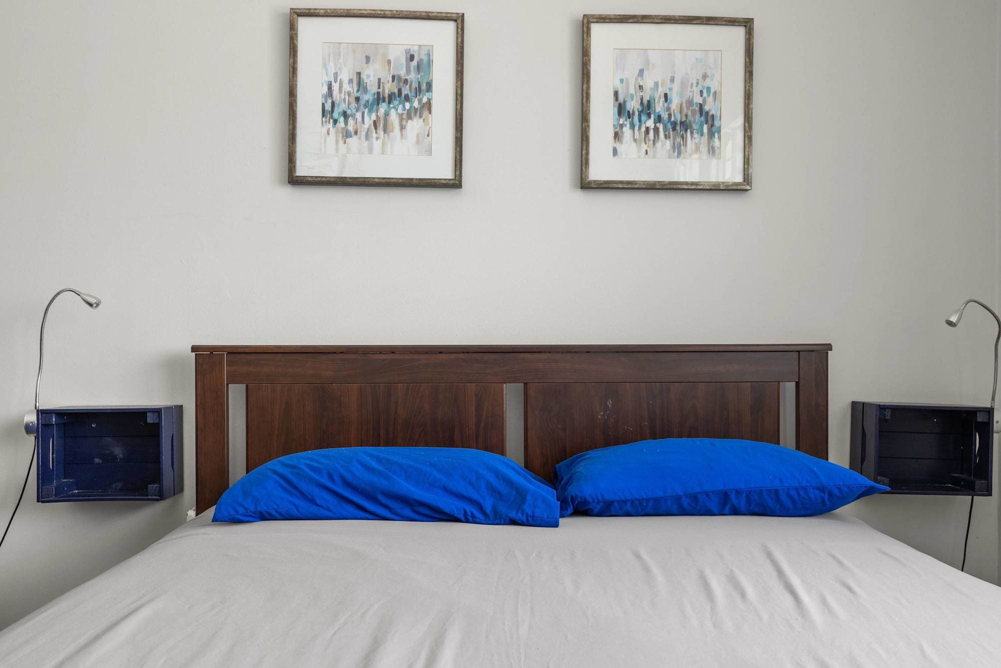 Close-up of pillows and art