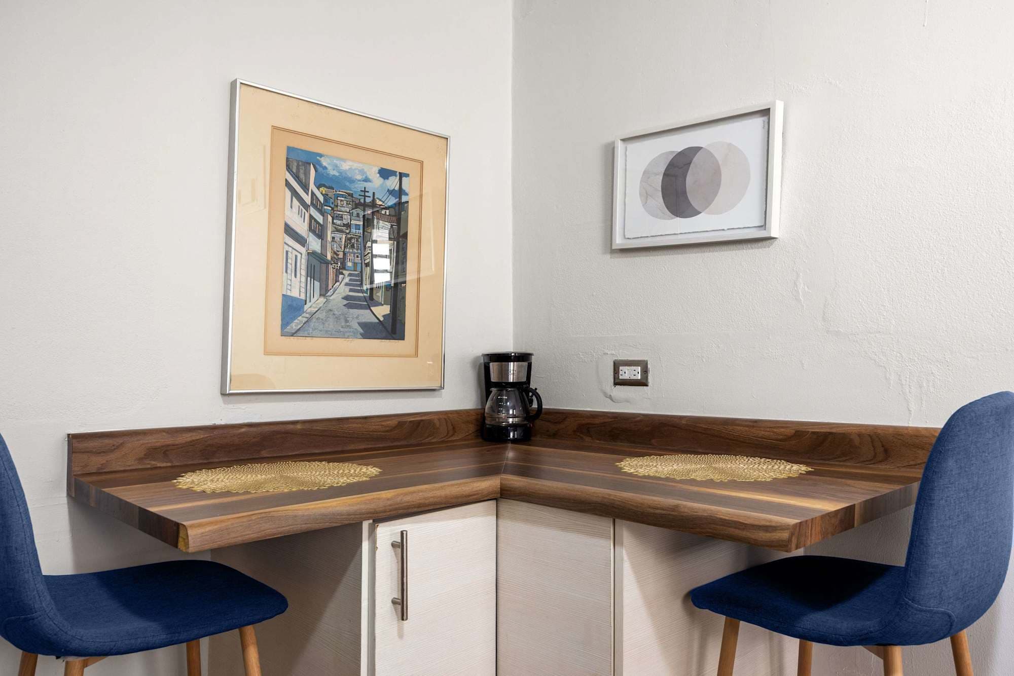 Dining nook with framed art