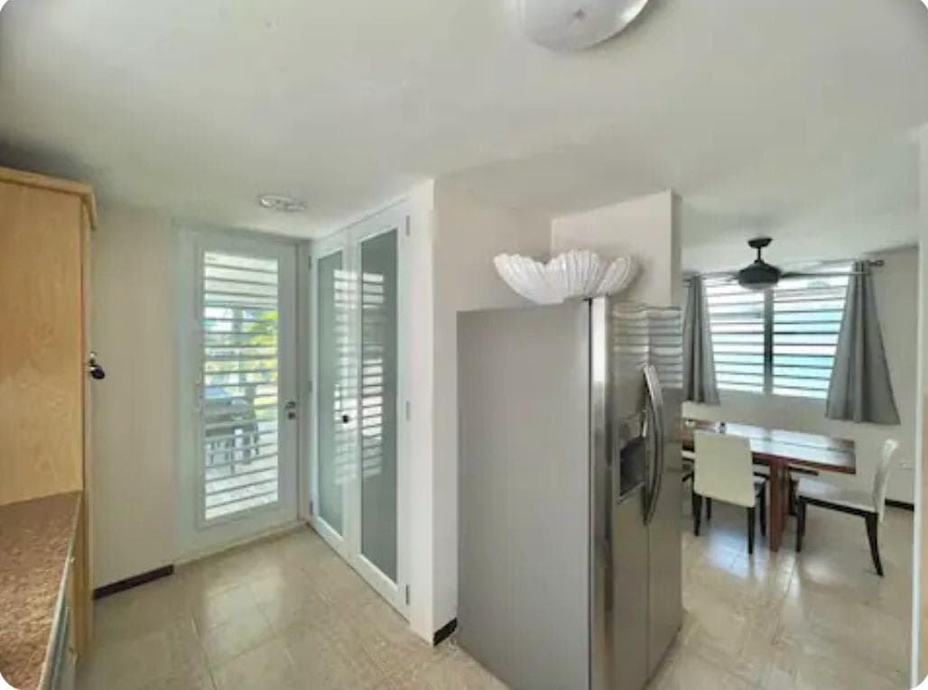 Kitchen opening to the dining area