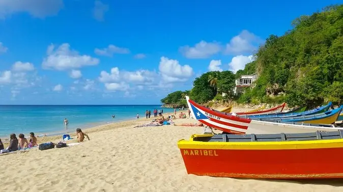 Dive into the refreshing turquoise water, feel the silky-soft sand between your toes, and savor delicious treats from the nearby kiosks. This world-famous beach offers an unforgettable experience.